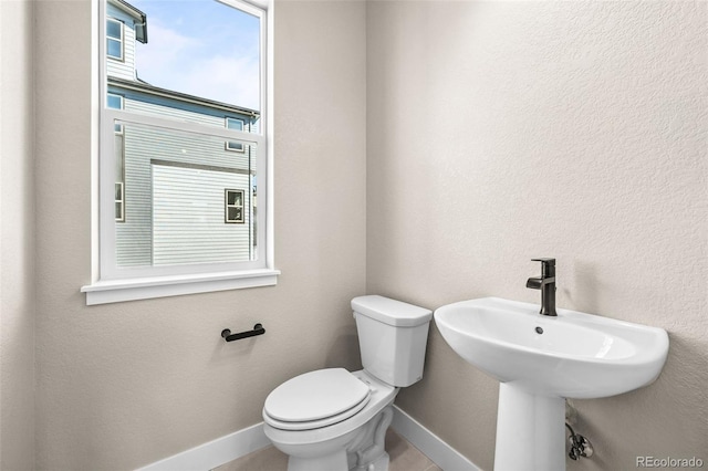 16605 Peak St, Broomfield, CO 80023 - half bath with baseboards and toilet