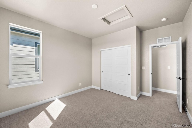 16605 Peak St, Broomfield, CO 80023 - unfurnished bedroom featuring carpet, attic access, and a closet