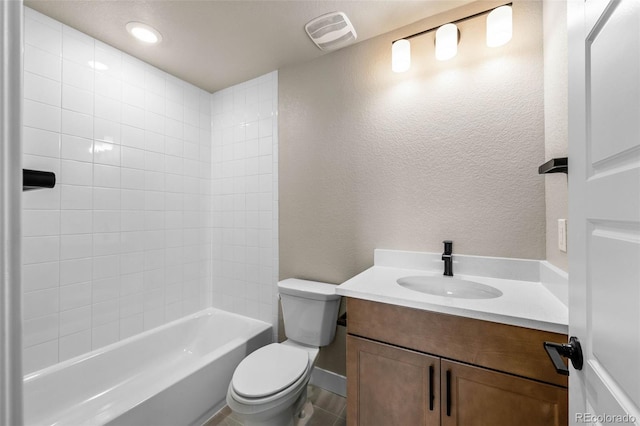 16605 Peak St, Broomfield, CO 80023 - bathroom with vanity, washtub / shower combination, and a textured wall