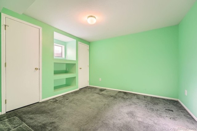 unfurnished bedroom with carpet flooring