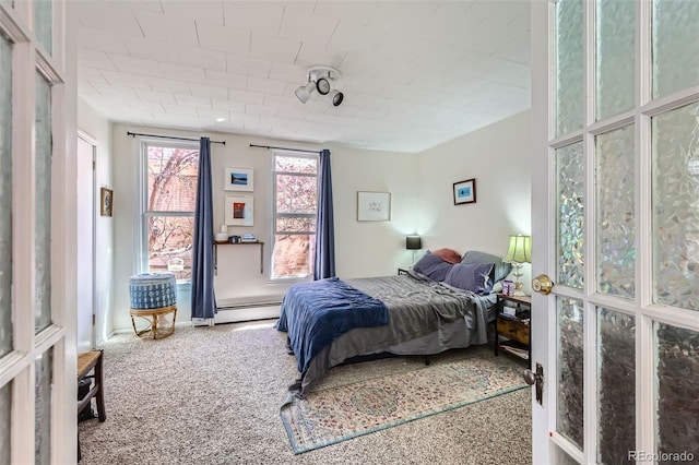 2122 E 13th Ave, Denver, CO 80206 - carpeted bedroom with baseboard heating