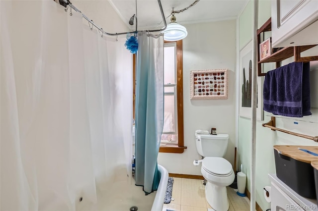 2122 E 13th Ave, Denver, CO 80206 - bathroom with a wealth of natural light, toilet, a shower with curtain, and baseboards