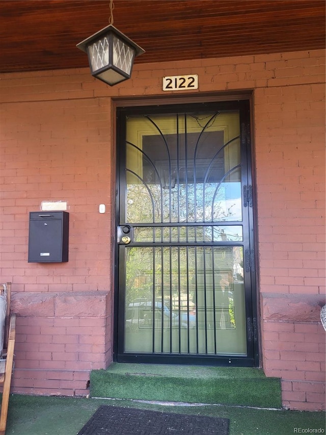 2122 E 13th Ave, Denver, CO 80206 - view of exterior entry with brick siding
