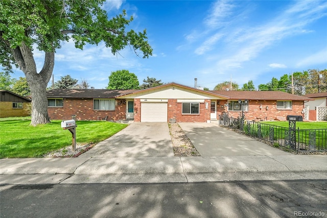 5175-5185 Simms Pl, Wheat Ridge, CO 80033 - single story home with a garage, brick siding, and concrete driveway