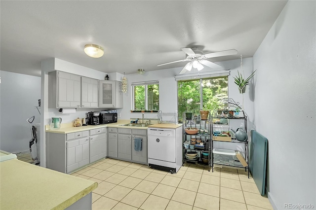 5175-5185 Simms Pl, Wheat Ridge, CO 80033 - kitchen featuring white dishwasher, black microwave, light countertops, a sink, and ceiling fan