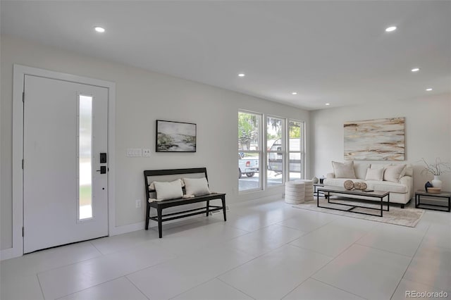 7684 S Ingalls St, Littleton, CO 80128 - entryway featuring recessed lighting and light tile patterned floors