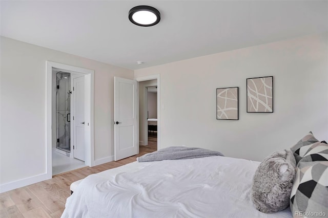 7684 S Ingalls St, Littleton, CO 80128 - bedroom featuring light wood-style flooring and baseboards