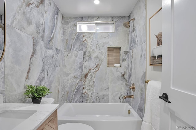 7684 S Ingalls St, Littleton, CO 80128 - bathroom with vanity, shower / bath combination, and tile walls