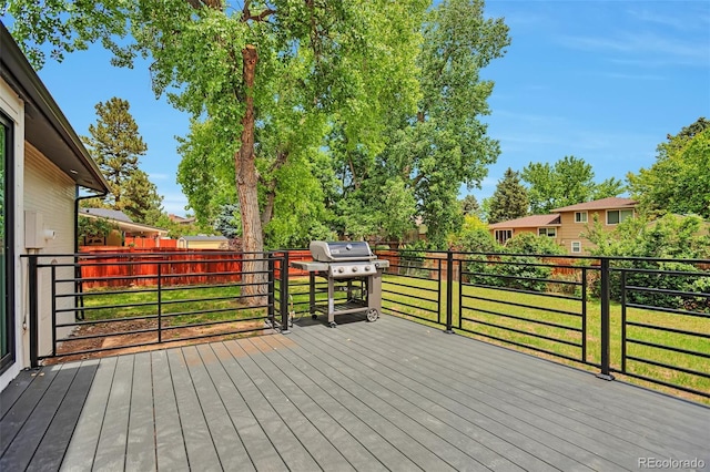 7684 S Ingalls St, Littleton, CO 80128 - deck with grilling area and a fenced backyard
