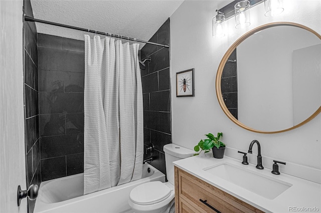 full bathroom with shower / bath combo, toilet, vanity, and a textured ceiling
