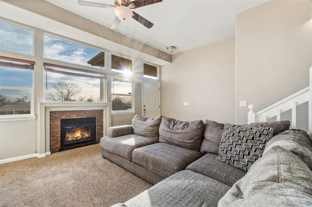 living room with carpet flooring and ceiling fan