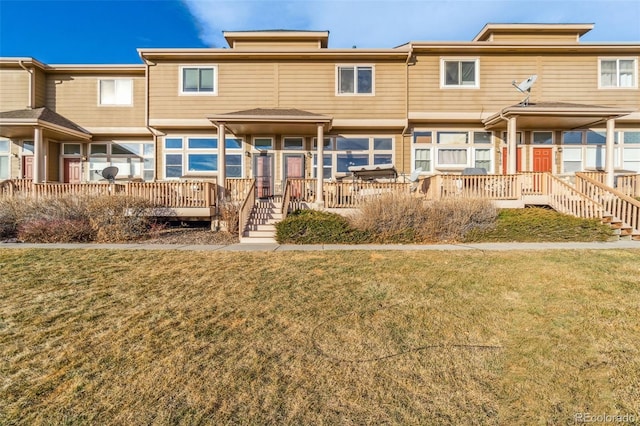 view of property with a front lawn