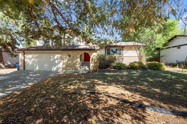 view of front of property with a garage