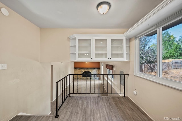 stairs featuring hardwood / wood-style flooring