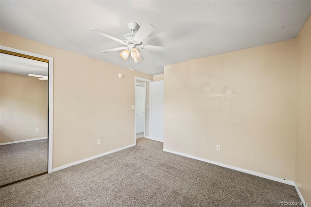 unfurnished bedroom with ceiling fan, a closet, and carpet