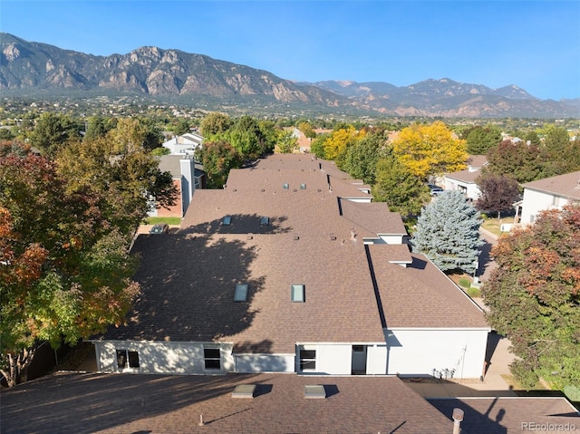 birds eye view of property with a mountain view