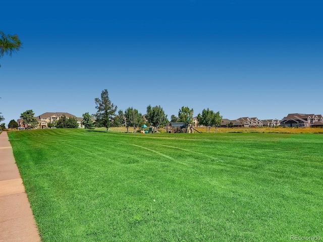 5705 N Genoa Way Unit 308, Aurora, CO 80019 - view of home's community featuring a yard and a residential view