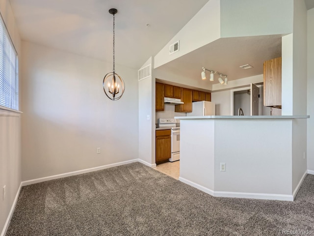 5705 N Genoa Way Unit 308, Aurora, CO 80019 - kitchen featuring white appliances, brown cabinets, light carpet, and a chandelier
