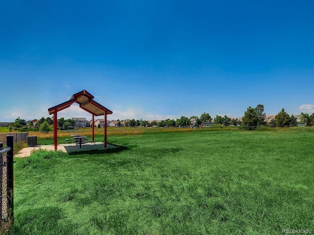 5705 N Genoa Way Unit 308, Aurora, CO 80019 - surrounding community featuring a lawn and a gazebo