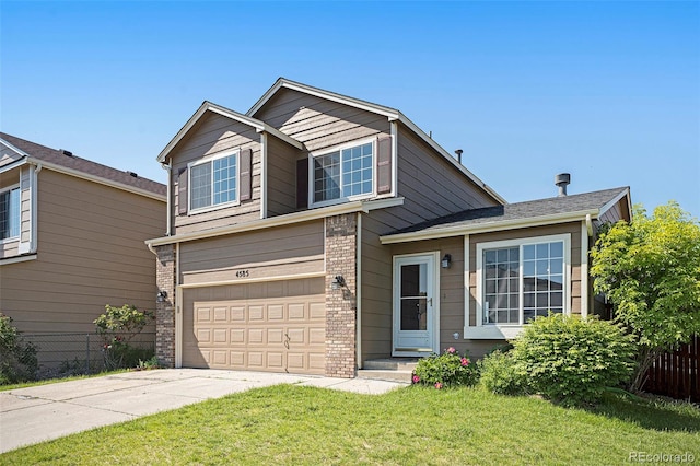 4585 Jet Wing Cir, Colorado Springs, CO 80916 - view of front of home featuring brick siding, driveway, and an attached garage