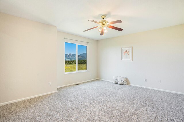 4585 Jet Wing Cir, Colorado Springs, CO 80916 - carpeted empty room with a ceiling fan and baseboards