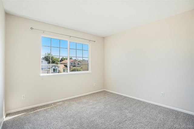 4585 Jet Wing Cir, Colorado Springs, CO 80916 - carpeted spare room with baseboards