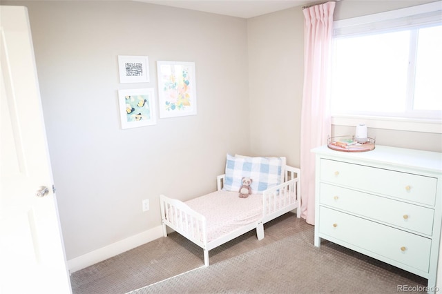 7100 Saulsbury St, Arvada, CO 80003 - carpeted bedroom with baseboards