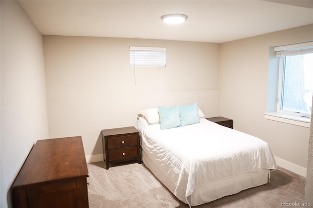 7100 Saulsbury St, Arvada, CO 80003 - carpeted bedroom featuring baseboards