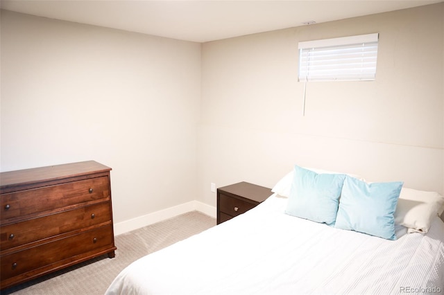 7100 Saulsbury St, Arvada, CO 80003 - carpeted bedroom featuring baseboards