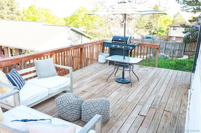 7100 Saulsbury St, Arvada, CO 80003 - wooden terrace featuring area for grilling