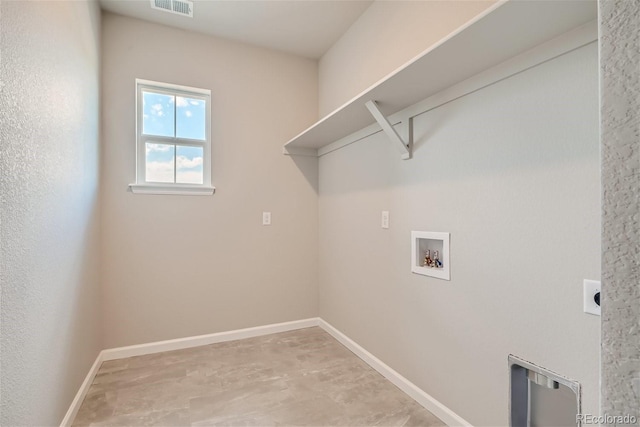 washroom featuring washer hookup and electric dryer hookup