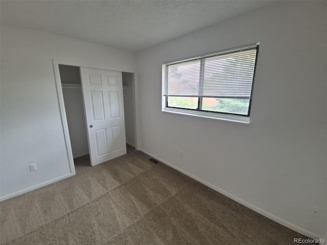 14190 E Gunnison Pl, Aurora, CO 80012 - unfurnished bedroom featuring carpet floors, baseboards, and a closet