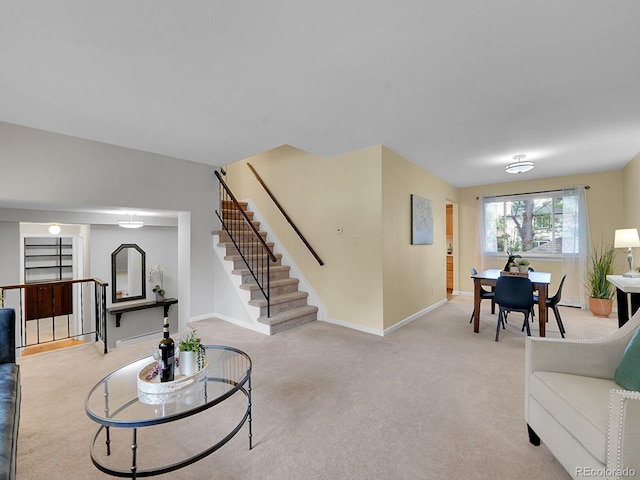 7168 S Lafayette Way, Centennial, CO 80122 - living area featuring light colored carpet and stairs