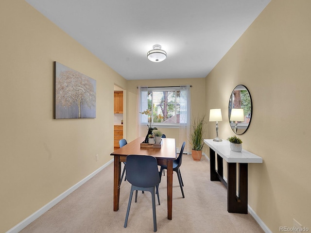 7168 S Lafayette Way, Centennial, CO 80122 - dining space with baseboards and light colored carpet