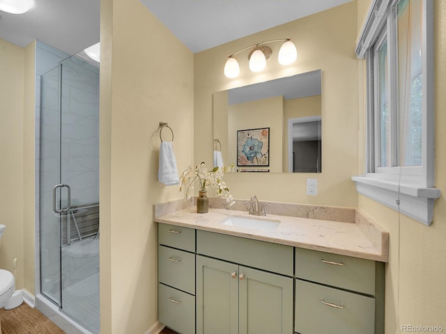 7168 S Lafayette Way, Centennial, CO 80122 - bathroom with vanity and a stall shower