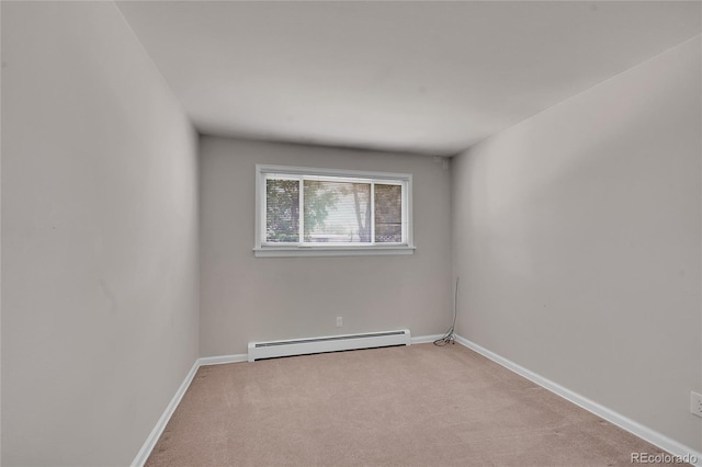 7168 S Lafayette Way, Centennial, CO 80122 - carpeted spare room featuring baseboard heating and baseboards
