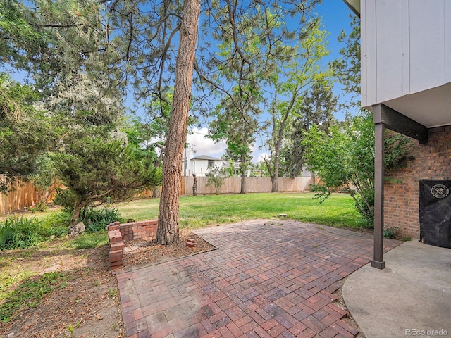7168 S Lafayette Way, Centennial, CO 80122 - fenced backyard with a patio area
