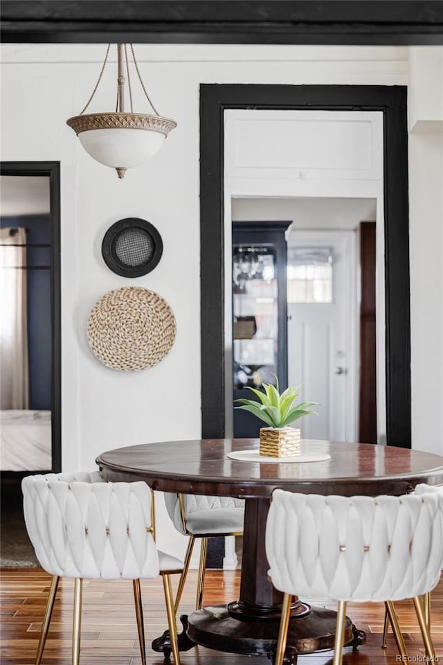 dining area featuring wood finished floors