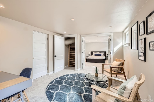 interior space with baseboards, carpet, and recessed lighting
