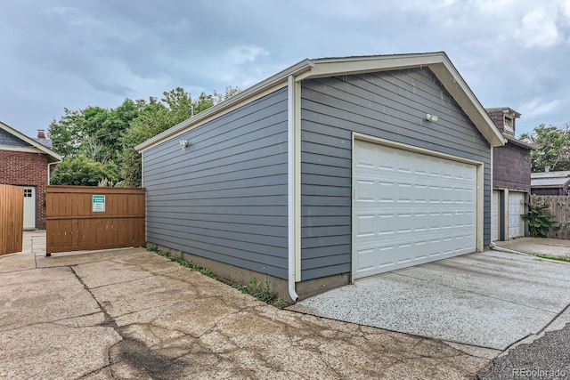 detached garage with fence