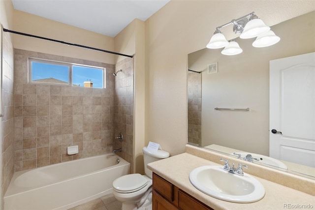 1965 Montura Vw Unit 204, Colorado Springs, CO 80919 - full bathroom featuring visible vents, shower / washtub combination, toilet, vanity, and tile patterned floors