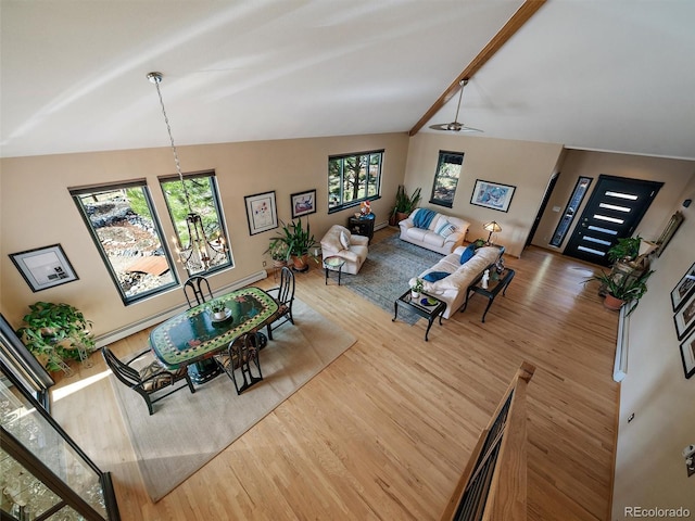 31518 Niakwa Rd, Evergreen, CO 80439 - living room with wood finished floors and ceiling fan
