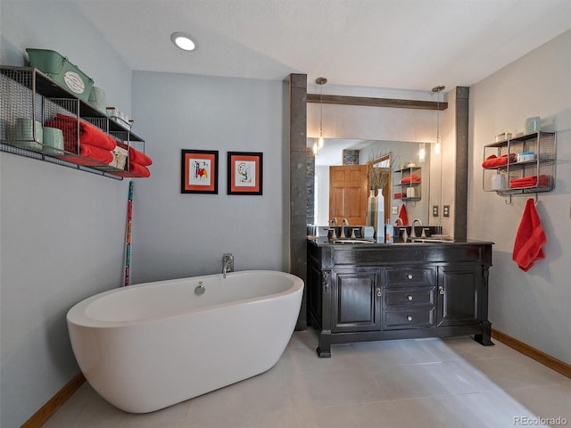 31518 Niakwa Rd, Evergreen, CO 80439 - full bathroom with double vanity, a freestanding tub, tile patterned floors, and baseboards