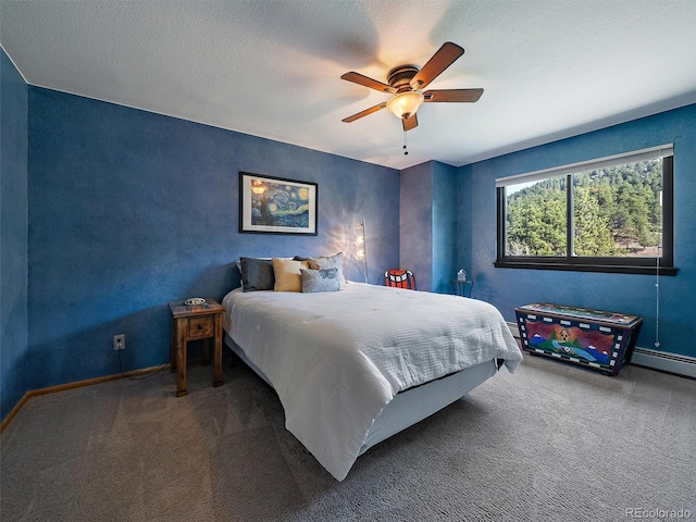 31518 Niakwa Rd, Evergreen, CO 80439 - carpeted bedroom featuring ceiling fan, baseboards, and a baseboard radiator