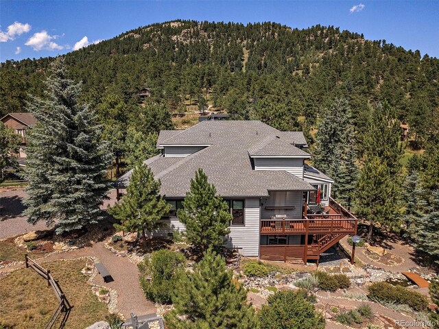 31518 Niakwa Rd, Evergreen, CO 80439 - view from above of property featuring a heavily wooded area and mountains