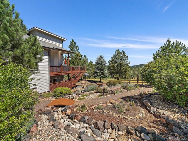 31518 Niakwa Rd, Evergreen, CO 80439 - view of yard with a deck