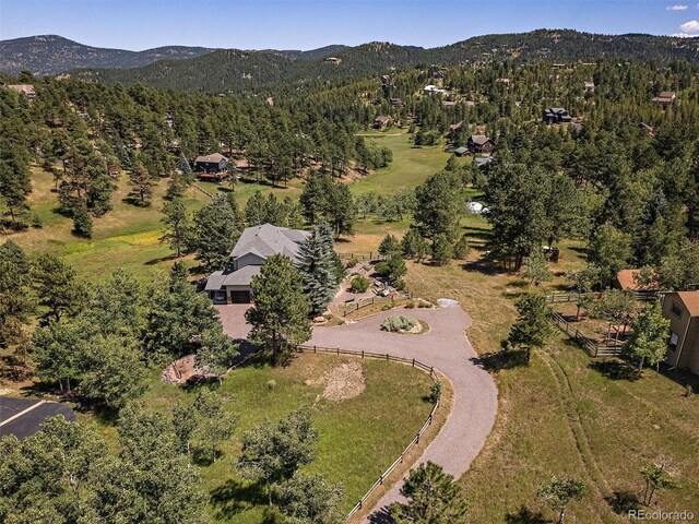 31518 Niakwa Rd, Evergreen, CO 80439 - aerial view of a mountainous background and a forest