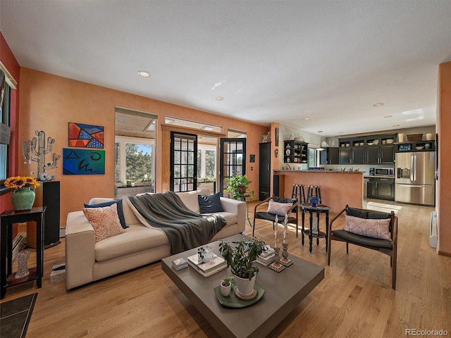31518 Niakwa Rd, Evergreen, CO 80439 - living room with light wood finished floors and recessed lighting