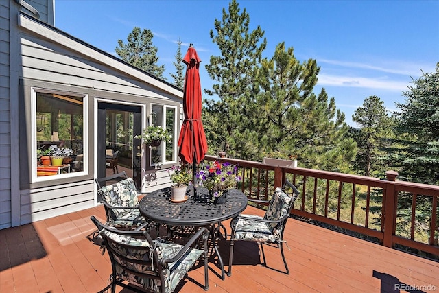 31518 Niakwa Rd, Evergreen, CO 80439 - deck featuring outdoor dining space