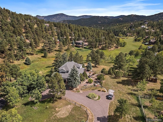 31518 Niakwa Rd, Evergreen, CO 80439 - view of property location featuring mountains and a forest